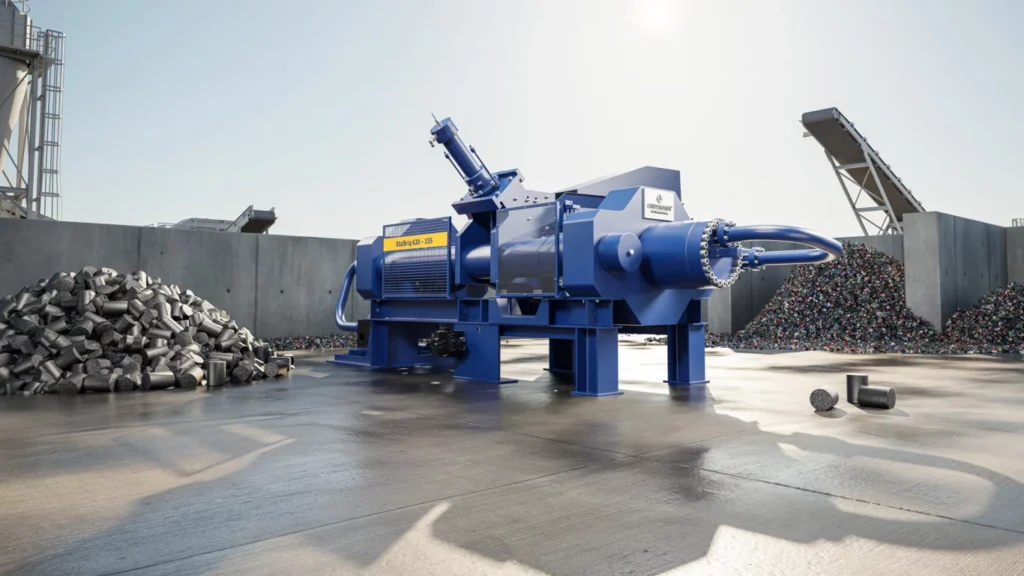 A LINDEMANN EtaBriq briquetting press beside a pile of metal briquettes